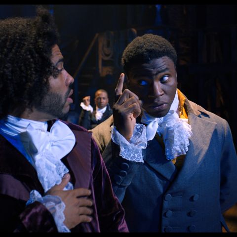 Daveed Diggs is Thomas Jefferson and Okieriete Onaodowan is James Madison in HAMILTON, the filmed version of the original Broadway production.